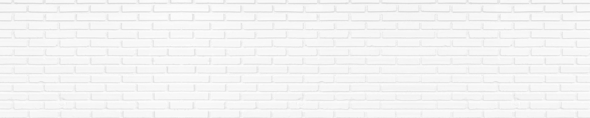 White brick wall - Welcome